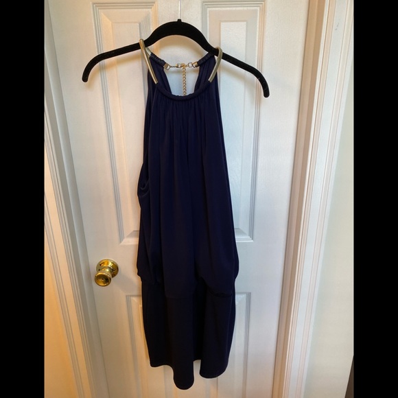 Short navy dress, tight on legs, loose on top